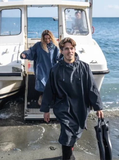 Fourth Element Storm Poncho -Dive Roam Fourth Element Storm Poncho Lifestyle Boat